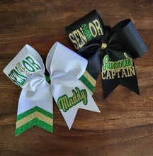 Load image into Gallery viewer, White, black, green, and gold Senior bow with custom name