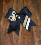 Navy blue hair bow with gold and white accents 