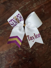 Load image into Gallery viewer, White purple and gold senior bow with custom name. 
